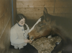 Peregrine lying in stall with Ak cropped