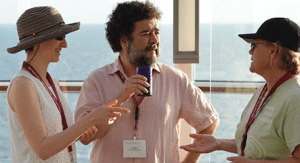 Jesús with two of the conference participants enjoying the perfect setting to discuss training questions.